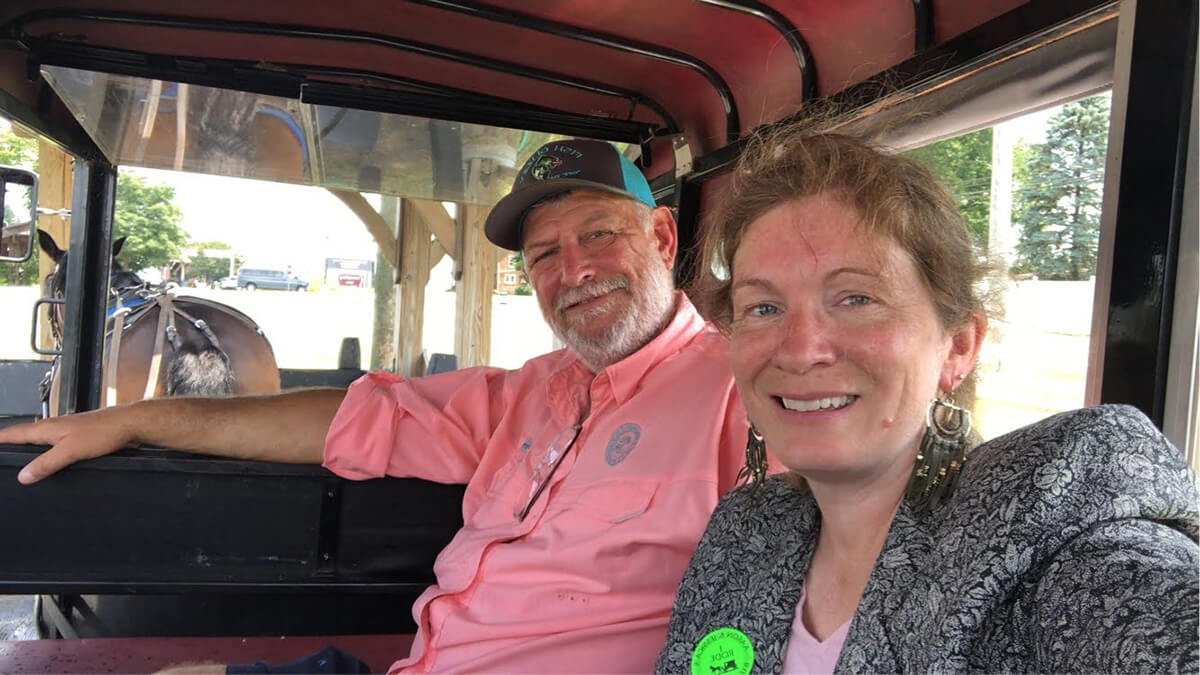 Vicki with Husband taking a Wagon Ride